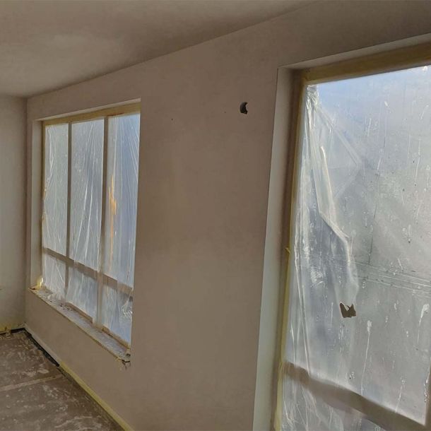 J Kok stukwerk woonkamer wanden stukadoren 